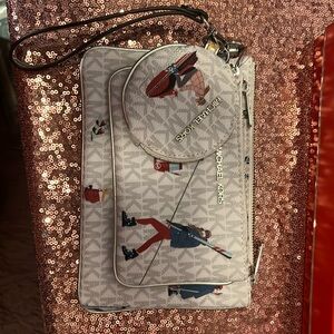 Michael Kors Jet Set Wristlet
Trio